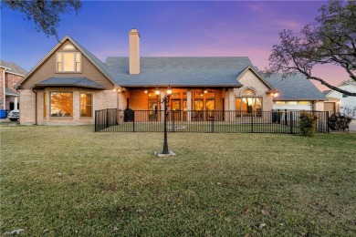 Welcome Home to 8401 Jonquil Dr, located on the 15th tee box of on The Lake Country Club - Lake Waco in Texas - for sale on GolfHomes.com, golf home, golf lot