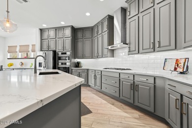 BETTER THAN NEW! With over $167,000 of added features, this on Verrado Golf Club - Victory in Arizona - for sale on GolfHomes.com, golf home, golf lot