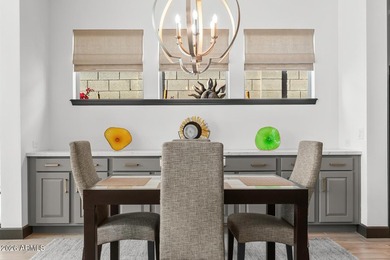 BETTER THAN NEW! With over $167,000 of added features, this on Verrado Golf Club - Victory in Arizona - for sale on GolfHomes.com, golf home, golf lot