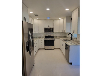 9368 SW 82nd Terrace Unit D presents a thoroughly renovated on On Top of the World Golf Course in Florida - for sale on GolfHomes.com, golf home, golf lot