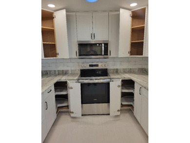 9368 SW 82nd Terrace Unit D presents a thoroughly renovated on On Top of the World Golf Course in Florida - for sale on GolfHomes.com, golf home, golf lot