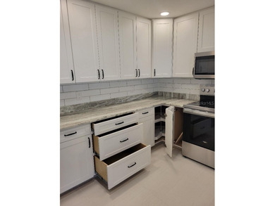 9368 SW 82nd Terrace Unit D presents a thoroughly renovated on On Top of the World Golf Course in Florida - for sale on GolfHomes.com, golf home, golf lot