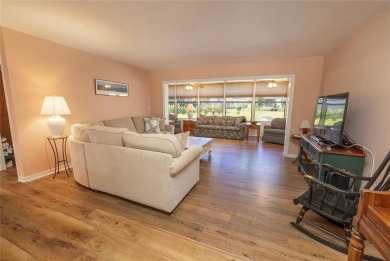 Step through the front door of this charming villa, and you feel on Emerald Greens Golf Resort and Country Club in Florida - for sale on GolfHomes.com, golf home, golf lot