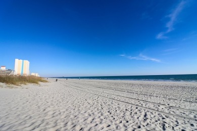 Discover coastal living at its finest with this 3-bedroom on Surf Golf and Beach Club in South Carolina - for sale on GolfHomes.com, golf home, golf lot