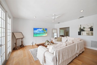 Welcome to this luxurious home featuring soaring ceilings on Weston Hills Country Club in Florida - for sale on GolfHomes.com, golf home, golf lot