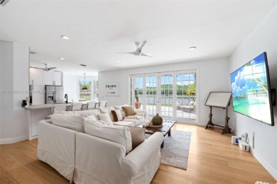 Welcome to this luxurious home featuring soaring ceilings on Weston Hills Country Club in Florida - for sale on GolfHomes.com, golf home, golf lot