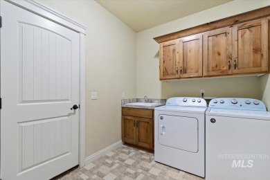 The kind of home you dream about! Nestled in a peaceful on Hunters Point Golf Club in Idaho - for sale on GolfHomes.com, golf home, golf lot