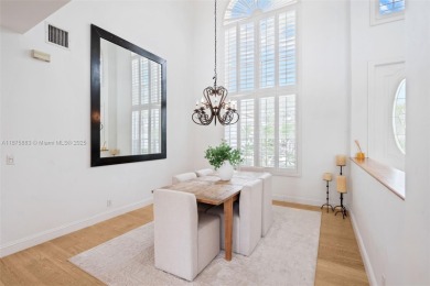 Welcome to this luxurious home featuring soaring ceilings on Weston Hills Country Club in Florida - for sale on GolfHomes.com, golf home, golf lot