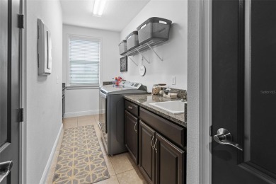 Welcome to 13139 Stanthorn Avenue--an upgraded Pinehurst model on Eagle Creek Golf Club in Florida - for sale on GolfHomes.com, golf home, golf lot