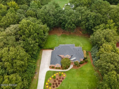 Welcome to this beautiful 4 bedroom brick home located in Monroe on Brickyard At Riverside Golf Club in Georgia - for sale on GolfHomes.com, golf home, golf lot