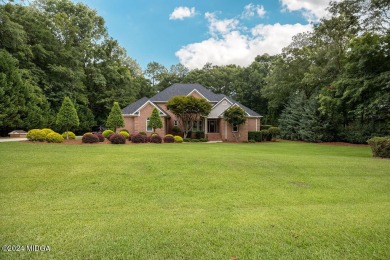 Welcome to this beautiful 4 bedroom brick home located in Monroe on Brickyard At Riverside Golf Club in Georgia - for sale on GolfHomes.com, golf home, golf lot