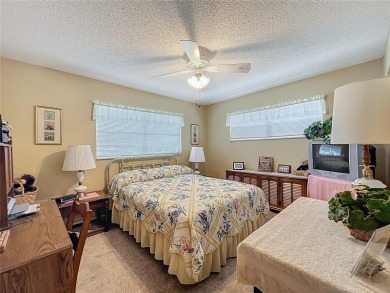 Welcome to this beautifully maintained 2-bedroom, 2-bath end on On Top of the World Golf Course in Florida - for sale on GolfHomes.com, golf home, golf lot