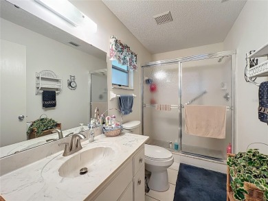 Welcome to this beautifully maintained 2-bedroom, 2-bath end on On Top of the World Golf Course in Florida - for sale on GolfHomes.com, golf home, golf lot