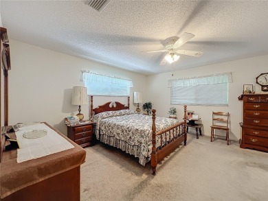 Welcome to this beautifully maintained 2-bedroom, 2-bath end on On Top of the World Golf Course in Florida - for sale on GolfHomes.com, golf home, golf lot