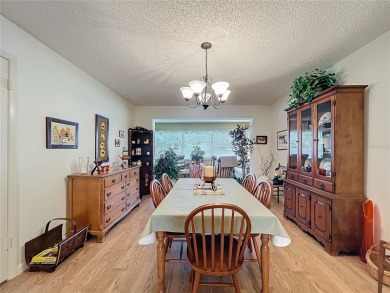 Welcome to this beautifully maintained 2-bedroom, 2-bath end on On Top of the World Golf Course in Florida - for sale on GolfHomes.com, golf home, golf lot