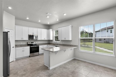 Welcome to this move-in ready 3-bedroom, 2.5-bathroom home in on Venetian Bay Golf Course in Florida - for sale on GolfHomes.com, golf home, golf lot