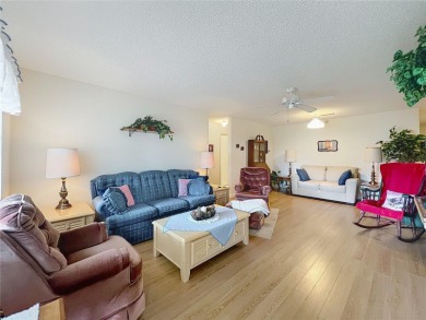 Welcome to this beautifully maintained 2-bedroom, 2-bath end on On Top of the World Golf Course in Florida - for sale on GolfHomes.com, golf home, golf lot