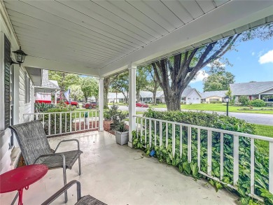 Welcome to this beautifully maintained 2-bedroom, 2-bath end on On Top of the World Golf Course in Florida - for sale on GolfHomes.com, golf home, golf lot