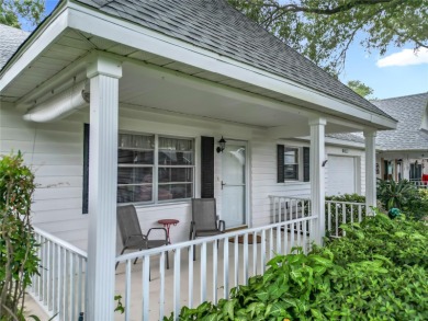Welcome to this beautifully maintained 2-bedroom, 2-bath end on On Top of the World Golf Course in Florida - for sale on GolfHomes.com, golf home, golf lot