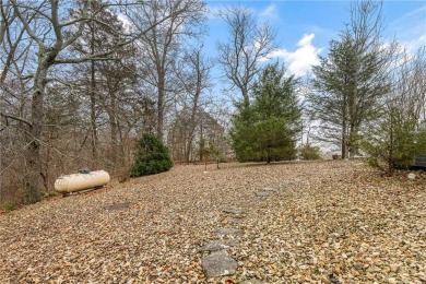 This home is a fantastic find! With its proximity to Highway 49 on Bella Vista Country Club and Golf Course in Arkansas - for sale on GolfHomes.com, golf home, golf lot