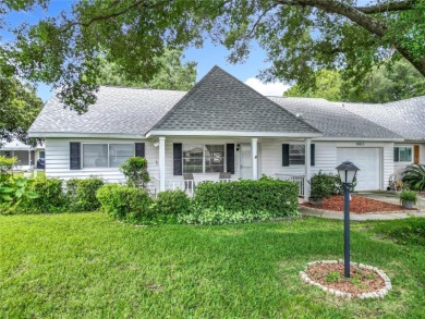 Welcome to this beautifully maintained 2-bedroom, 2-bath end on On Top of the World Golf Course in Florida - for sale on GolfHomes.com, golf home, golf lot