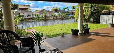 One-of-a-kind Mediterranean-style single-family townhouse with on Country Club of Miami in Florida - for sale on GolfHomes.com, golf home, golf lot