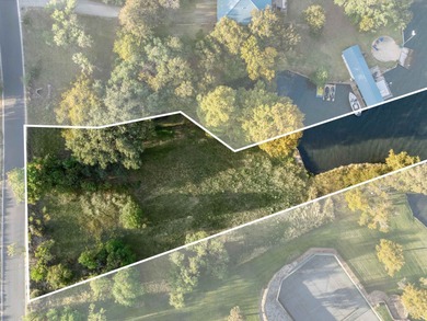 Set along the southern shores of Lake LBJ in coveted Blue Lake on Blue Lake Golf Club in Texas - for sale on GolfHomes.com, golf home, golf lot