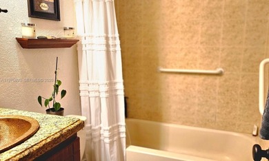 One-of-a-kind Mediterranean-style single-family townhouse with on Country Club of Miami in Florida - for sale on GolfHomes.com, golf home, golf lot