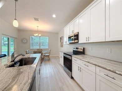 Enjoy Florida living at its finest in this beautifully on Meadow Oaks Golf and Country Club in Florida - for sale on GolfHomes.com, golf home, golf lot