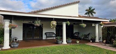 One-of-a-kind Mediterranean-style single-family townhouse with on Country Club of Miami in Florida - for sale on GolfHomes.com, golf home, golf lot