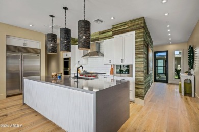 Discover this beautiful, turnkey, designer townhome at The on Desert Mountain Golf Club - Renegade Course in Arizona - for sale on GolfHomes.com, golf home, golf lot