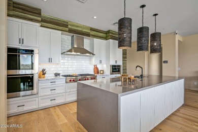 Discover this beautiful, turnkey, designer townhome at The on Desert Mountain Golf Club - Renegade Course in Arizona - for sale on GolfHomes.com, golf home, golf lot