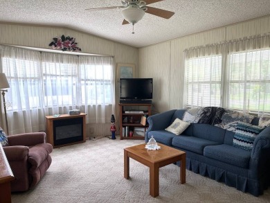 MOTIVATED SELLERS! HOME IS PRICED TO SELL. 2-BEDROOM, 2-BATHROOM on Anglers Green Golf Course in Florida - for sale on GolfHomes.com, golf home, golf lot