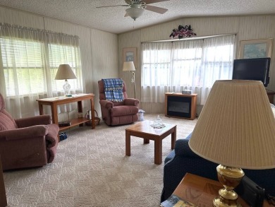 MOTIVATED SELLERS! HOME IS PRICED TO SELL. 2-BEDROOM, 2-BATHROOM on Anglers Green Golf Course in Florida - for sale on GolfHomes.com, golf home, golf lot