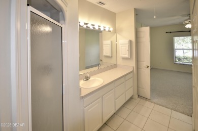 Golf Villa with an amazing golf and water view! This bright and on Turnbull Bay Golf Club in Florida - for sale on GolfHomes.com, golf home, golf lot
