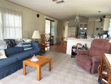 MOTIVATED SELLERS! HOME IS PRICED TO SELL. 2-BEDROOM, 2-BATHROOM on Anglers Green Golf Course in Florida - for sale on GolfHomes.com, golf home, golf lot