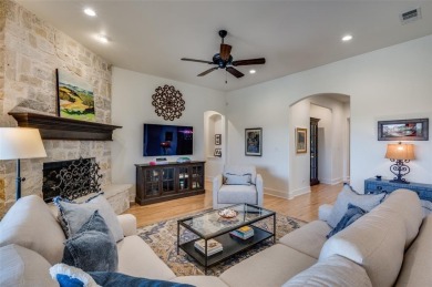 Charming curb appeal and a beautifully detailed brick and stone on The Tribute At the Colony in Texas - for sale on GolfHomes.com, golf home, golf lot
