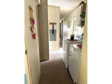 MOTIVATED SELLERS! HOME IS PRICED TO SELL. 2-BEDROOM, 2-BATHROOM on Anglers Green Golf Course in Florida - for sale on GolfHomes.com, golf home, golf lot