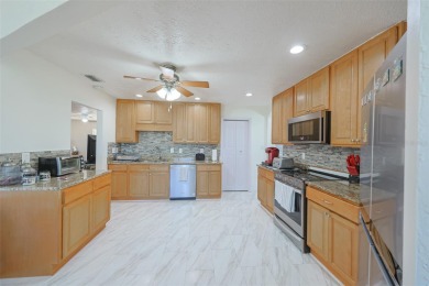 METICULOUSLY MAINTAINED WITH PRIDE OF OWNERSHIP this is a - NO on North Lakes Golf Course in Florida - for sale on GolfHomes.com, golf home, golf lot