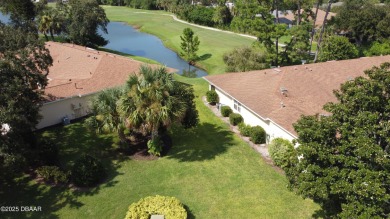 Golf Villa with an amazing golf and water view! This bright and on Turnbull Bay Golf Club in Florida - for sale on GolfHomes.com, golf home, golf lot