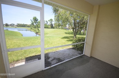 Golf Villa with an amazing golf and water view! This bright and on Turnbull Bay Golf Club in Florida - for sale on GolfHomes.com, golf home, golf lot