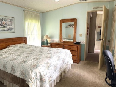 MOTIVATED SELLERS! HOME IS PRICED TO SELL. 2-BEDROOM, 2-BATHROOM on Anglers Green Golf Course in Florida - for sale on GolfHomes.com, golf home, golf lot