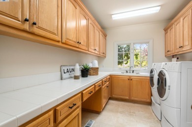 Discover a stunning French Country estate in the gated community on Ruby Hill Golf Club in California - for sale on GolfHomes.com, golf home, golf lot