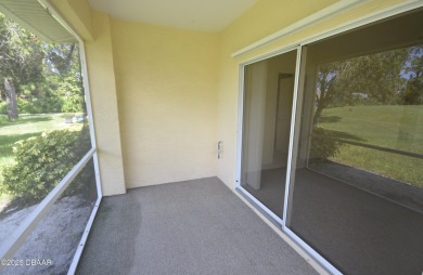 Golf Villa with an amazing golf and water view! This bright and on Turnbull Bay Golf Club in Florida - for sale on GolfHomes.com, golf home, golf lot