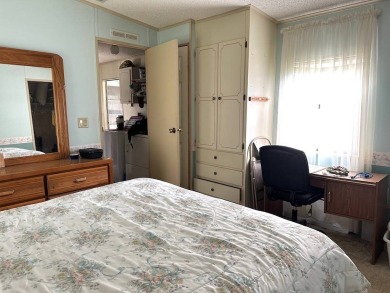 MOTIVATED SELLERS! HOME IS PRICED TO SELL. 2-BEDROOM, 2-BATHROOM on Anglers Green Golf Course in Florida - for sale on GolfHomes.com, golf home, golf lot