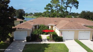 Golf Villa with an amazing golf and water view! This bright and on Turnbull Bay Golf Club in Florida - for sale on GolfHomes.com, golf home, golf lot
