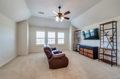 Charming curb appeal and a beautifully detailed brick and stone on The Tribute At the Colony in Texas - for sale on GolfHomes.com, golf home, golf lot