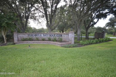 Golf Villa with an amazing golf and water view! This bright and on Turnbull Bay Golf Club in Florida - for sale on GolfHomes.com, golf home, golf lot