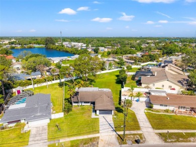 Freshly renovated and ready for a new chapter, 6070 Denver St NE on Mangrove Bay Golf Course in Florida - for sale on GolfHomes.com, golf home, golf lot