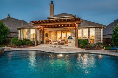 Charming curb appeal and a beautifully detailed brick and stone on The Tribute At the Colony in Texas - for sale on GolfHomes.com, golf home, golf lot